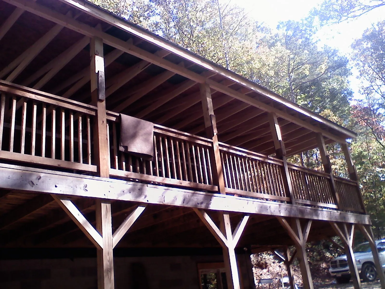 Timber framing under a new elevated porch and deck — Roof Leak Repair in Ames by Roofing Brothers